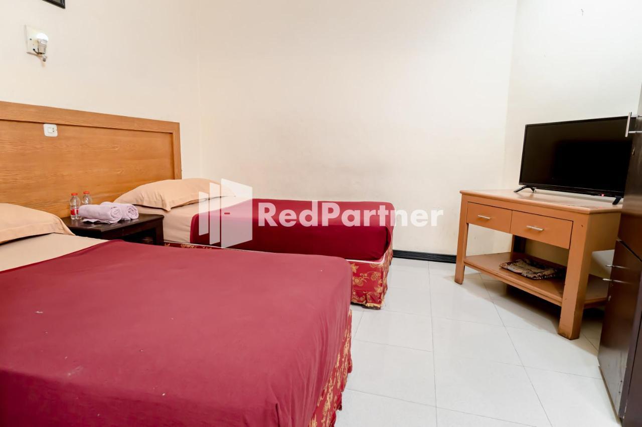 Cherry Pink Hotel Medan Mitra Reddoorz المظهر الخارجي الصورة