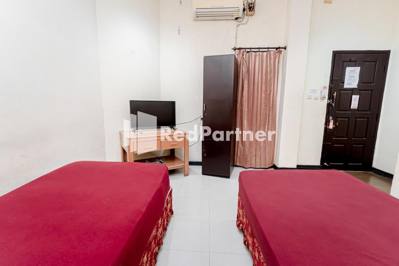 Cherry Pink Hotel Medan Mitra Reddoorz المظهر الخارجي الصورة