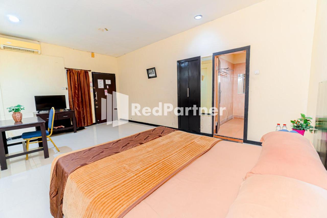 Cherry Pink Hotel Medan Mitra Reddoorz المظهر الخارجي الصورة